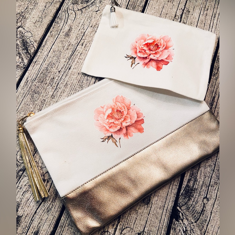 NWT! Set of 2 white cotton canvas zippered pouches. Gorgeous flower vinyl print